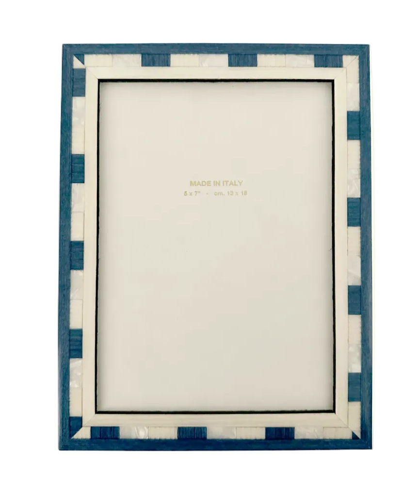 Blue and white patterned picture frame on a white background