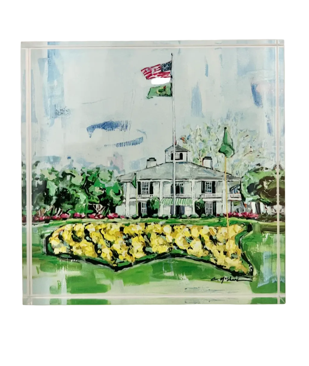 Giclee print of a golf course with a clubhouse and American flag on a white background