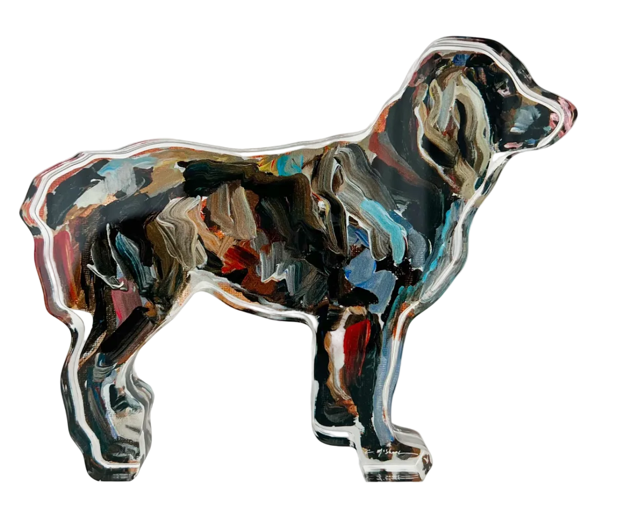 Metallic dog-shaped object on a white background