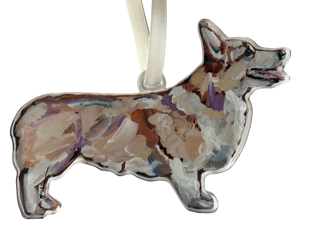 A acrylic ornament depicting a blonde corgi dog with a ribbon at the top.