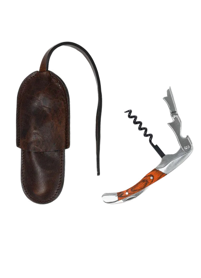 Corkscrew with leather sheath on a white background