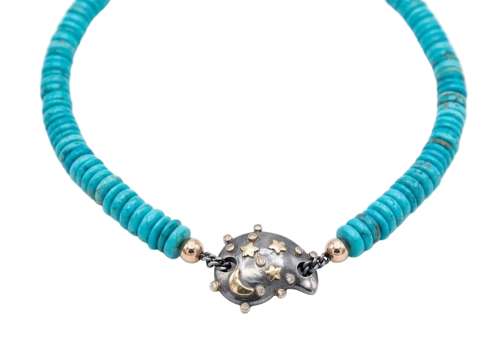 Turquoise beaded necklace with a decorative clasp on a white background