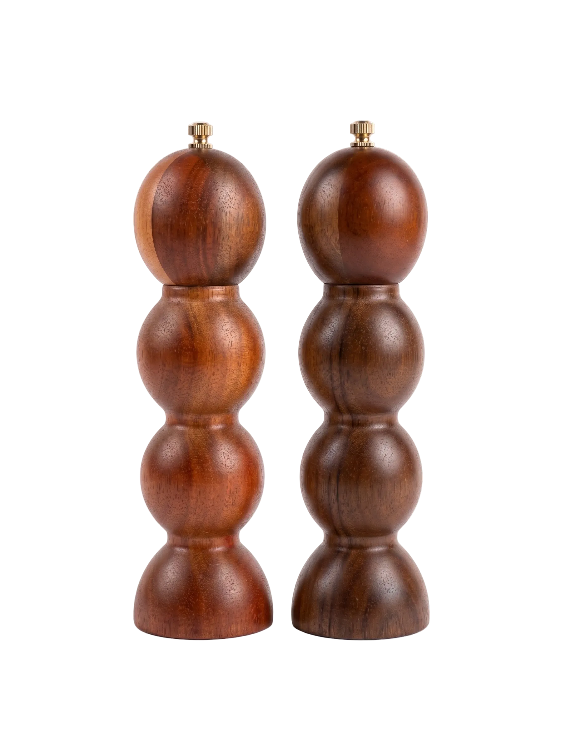 Pair of wooden salt and pepper shakers on a white background