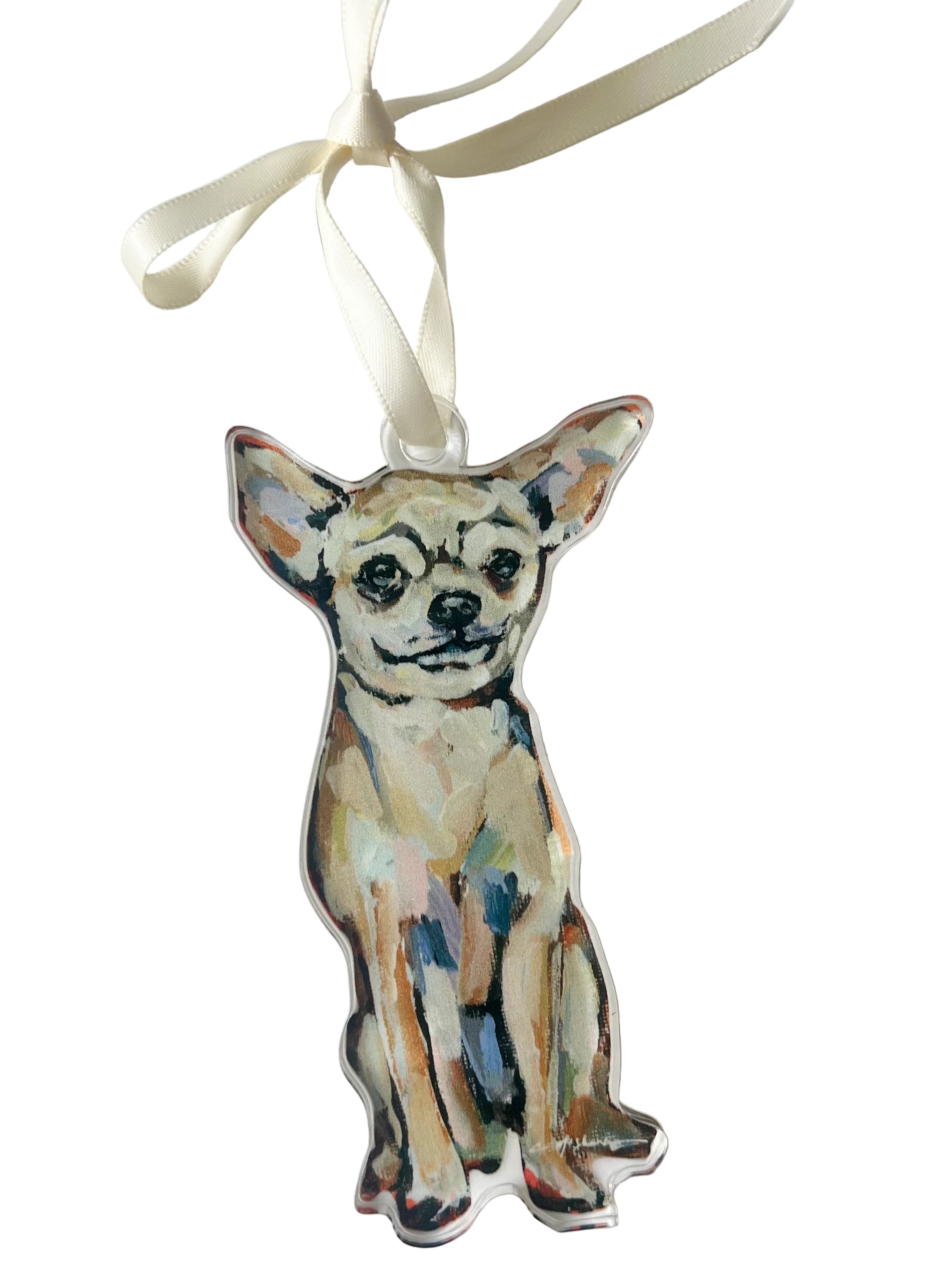 Decorative ornament shaped like a chihuahua dog with a ribbon on a light gray background