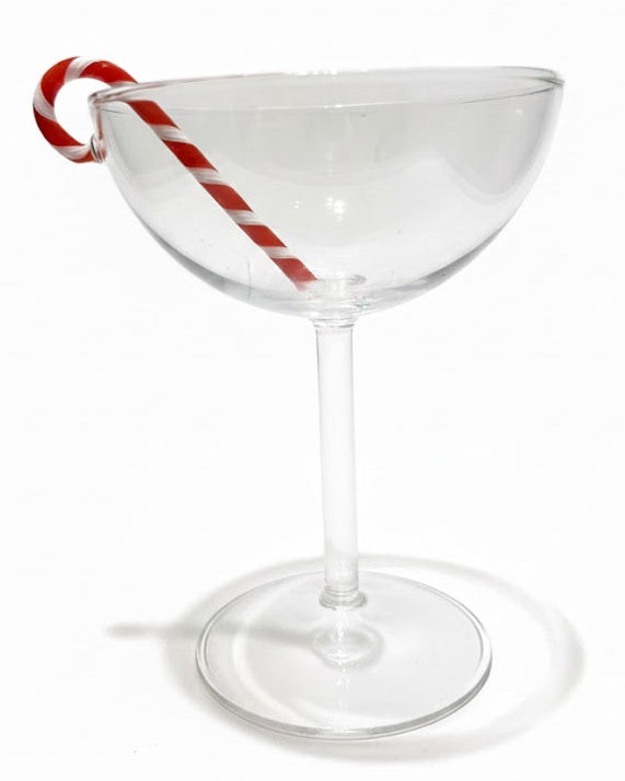 Clear glass with a candy cane on a white background