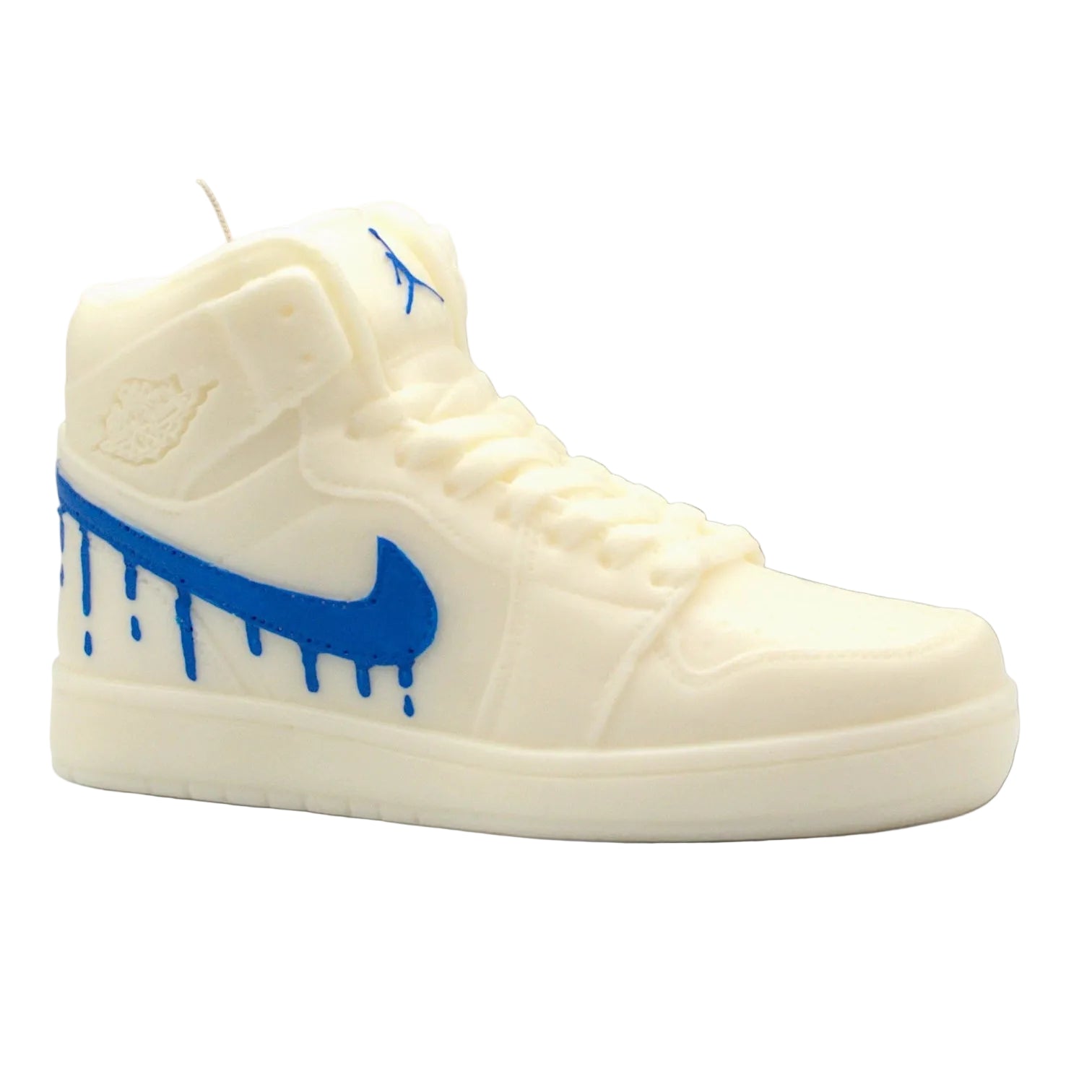 White sneaker candle with blue swoosh logo on a white background nike candle