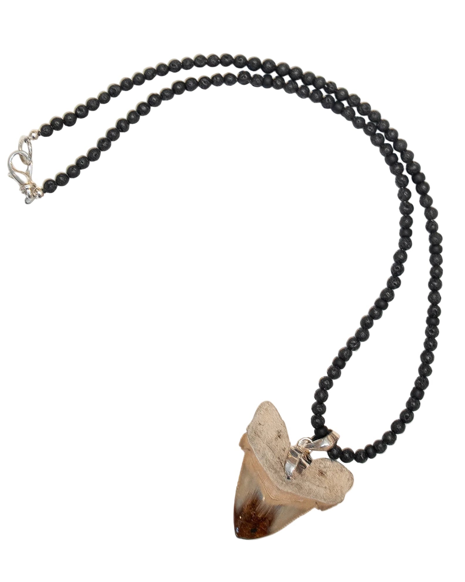 Necklace with black beads and a brown pendant on a white background