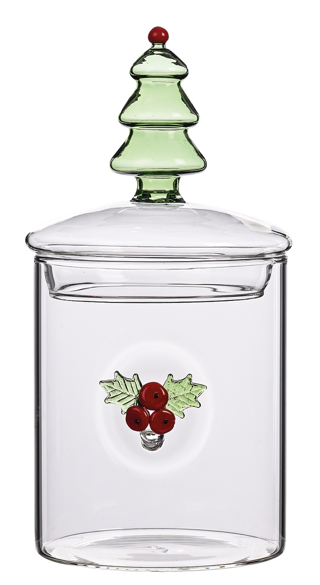 A clear glass jar with a lid featuring a green Christmas tree design and a small red berry ornament on top, set against a plain white background.