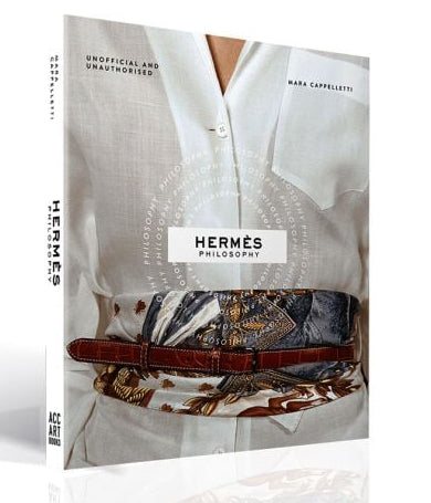 Book cover of 'Hermes Philosophy' with a person wearing a white shirt and brown belt.