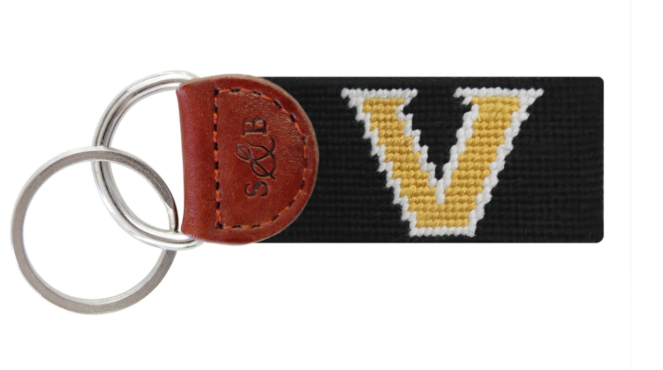Keychain with letter 'V' on a black background