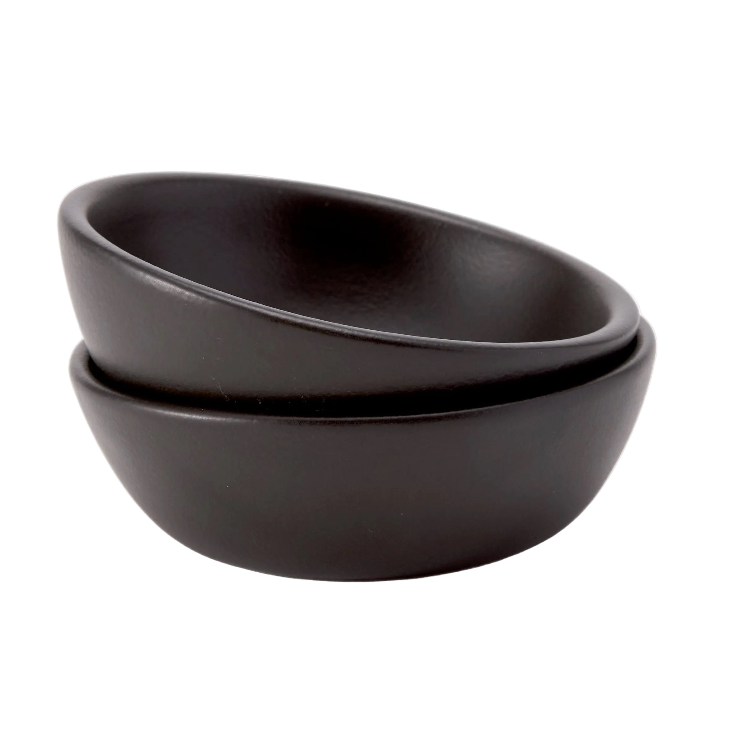 Two black ceramic bowls stacked on a white background