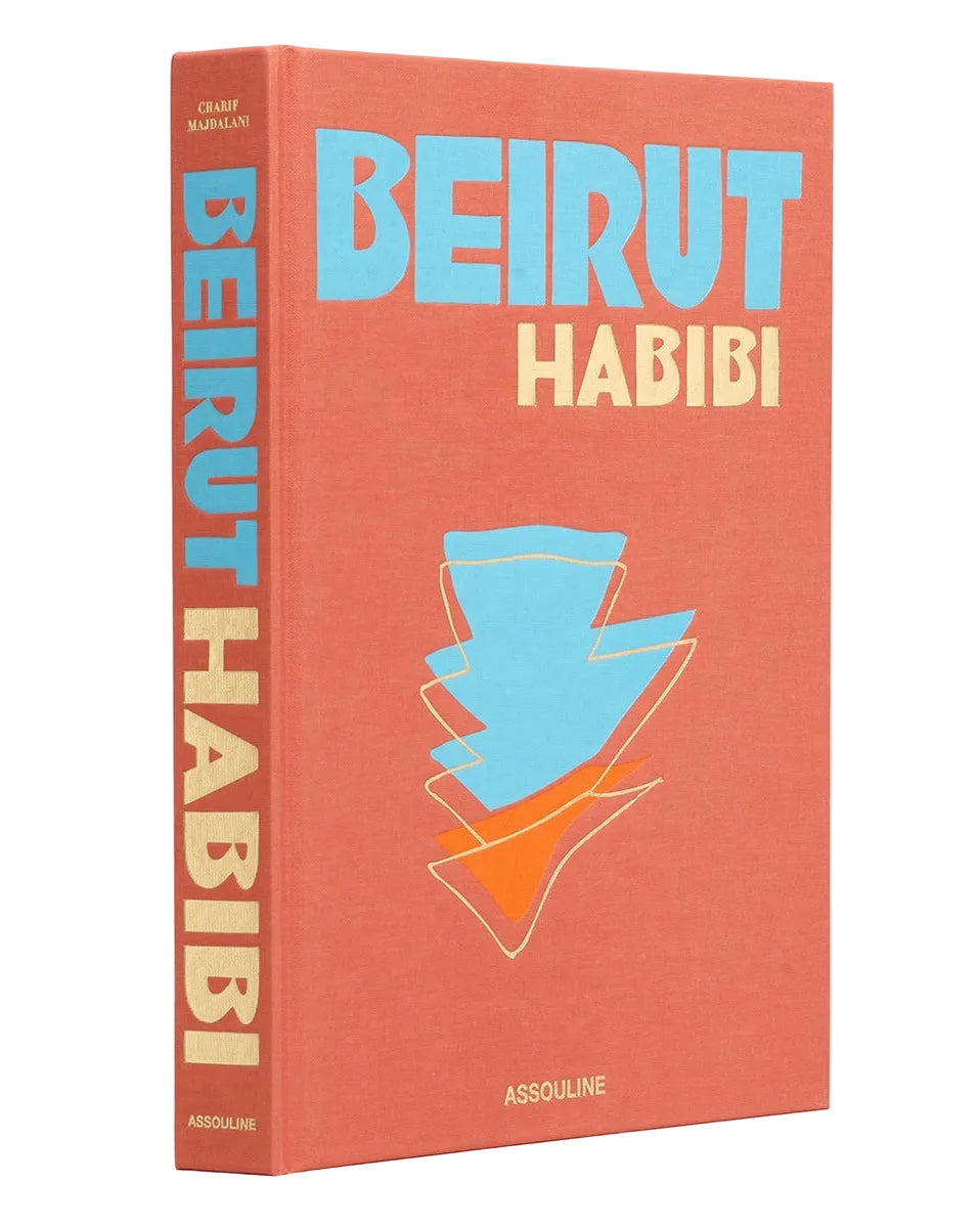Book titled 'Beirut Habibi' with a red cover and blue and orange design on a white background