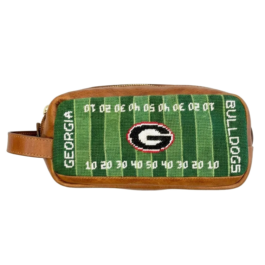 Green and brown toiletry bag with Georgia Bulldogs logo on a white background
