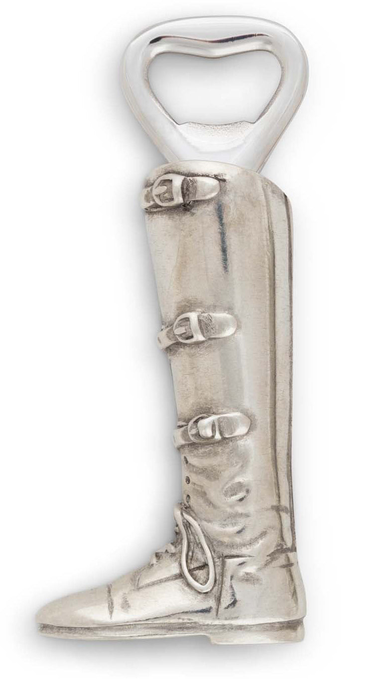 Silver boot-shaped bottle opener on a white background