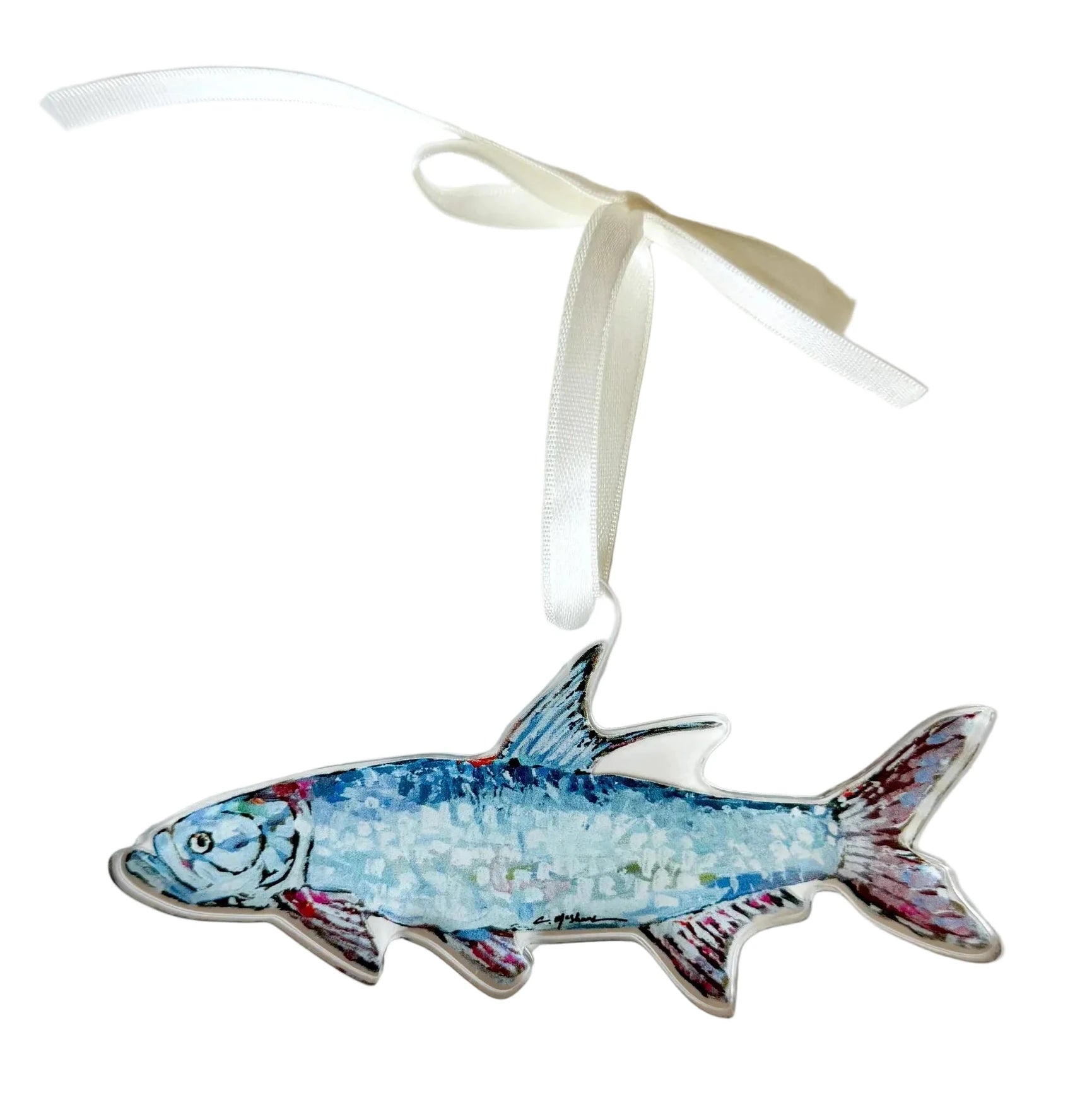 Decorative fish ornament hand crafted and painted with a colorful pattern on a white background