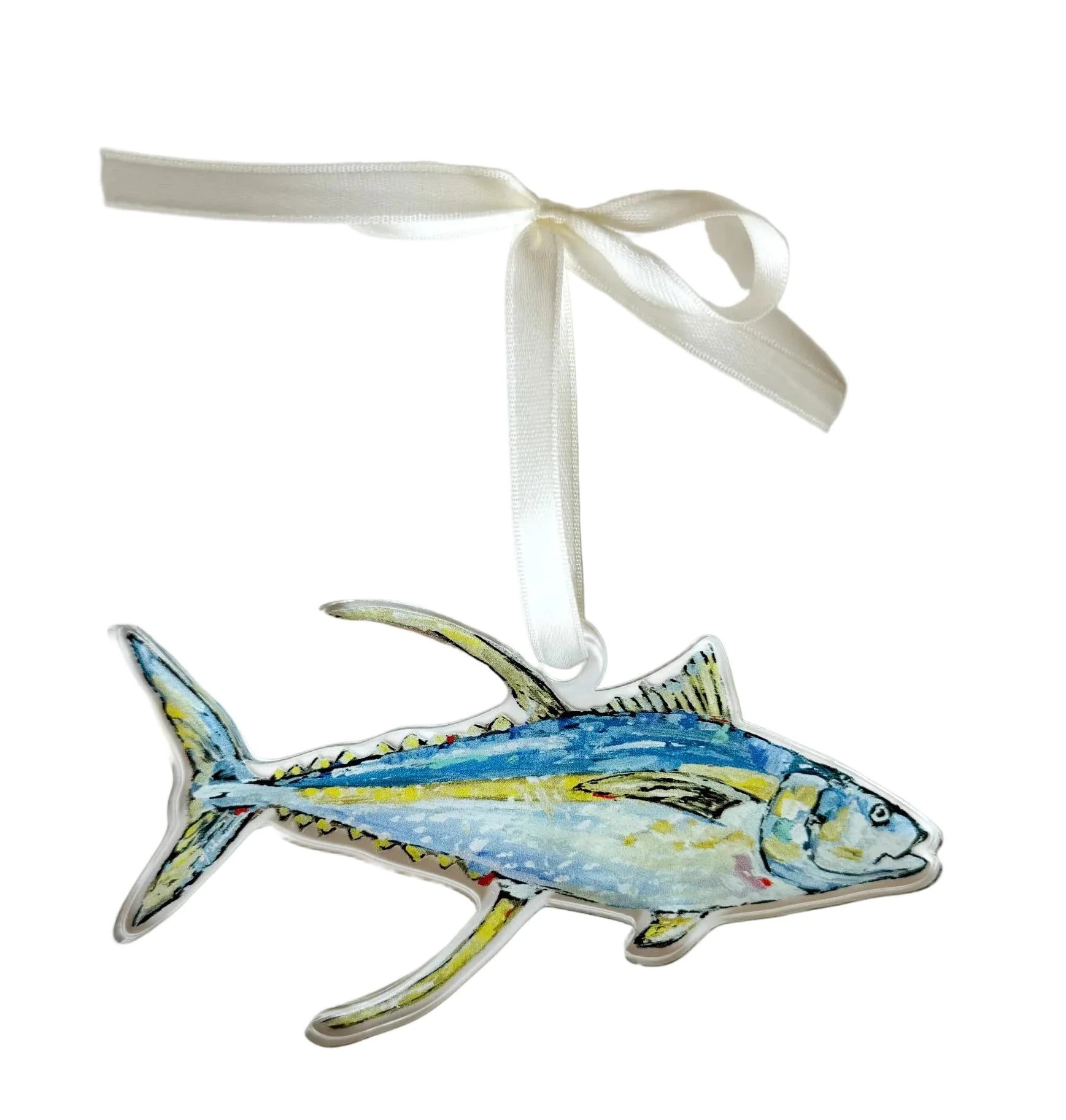 Decorative fish ornament with a ribbon on a white background