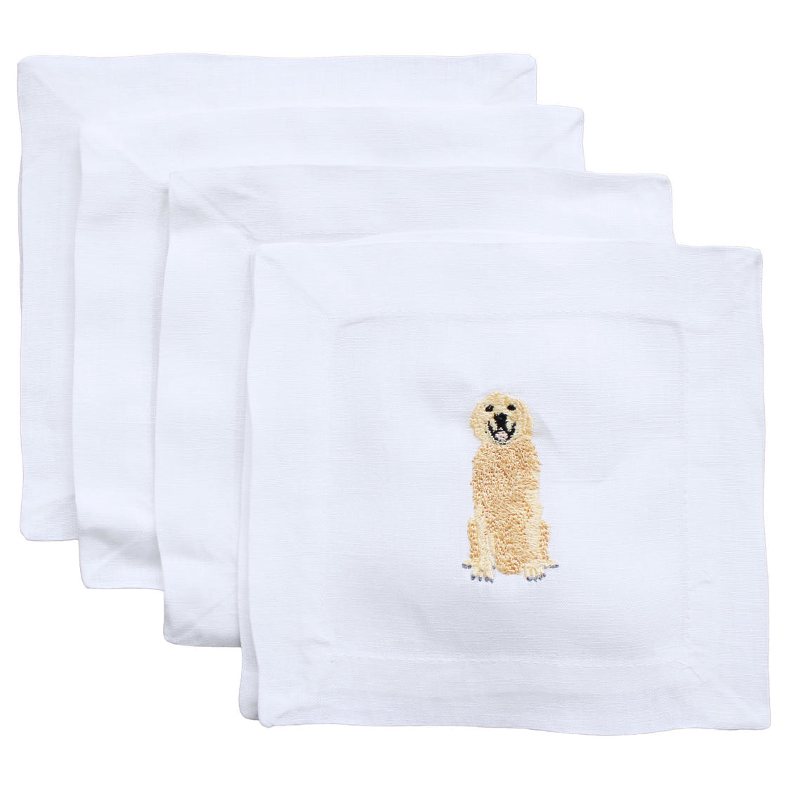 A set of white cocktail napkins with an embroidered image of a Golden Retriever dog on the front.