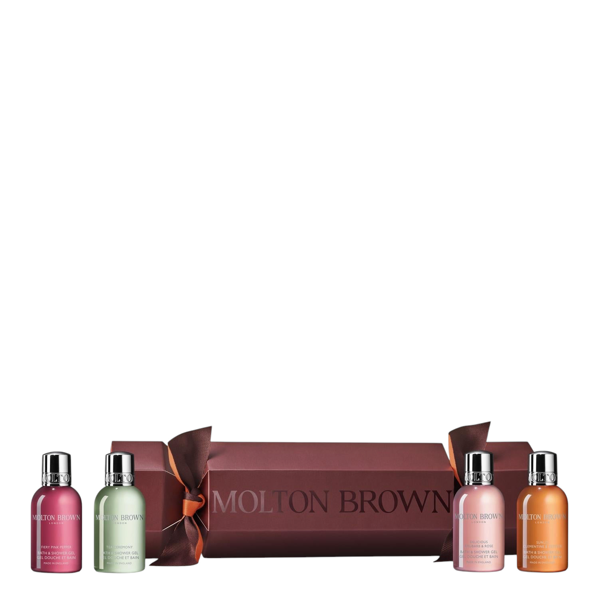 Miller Collective Woody Citrus Christmas Cracker gift set featuring four 50ml bath and shower gels in a festive box.