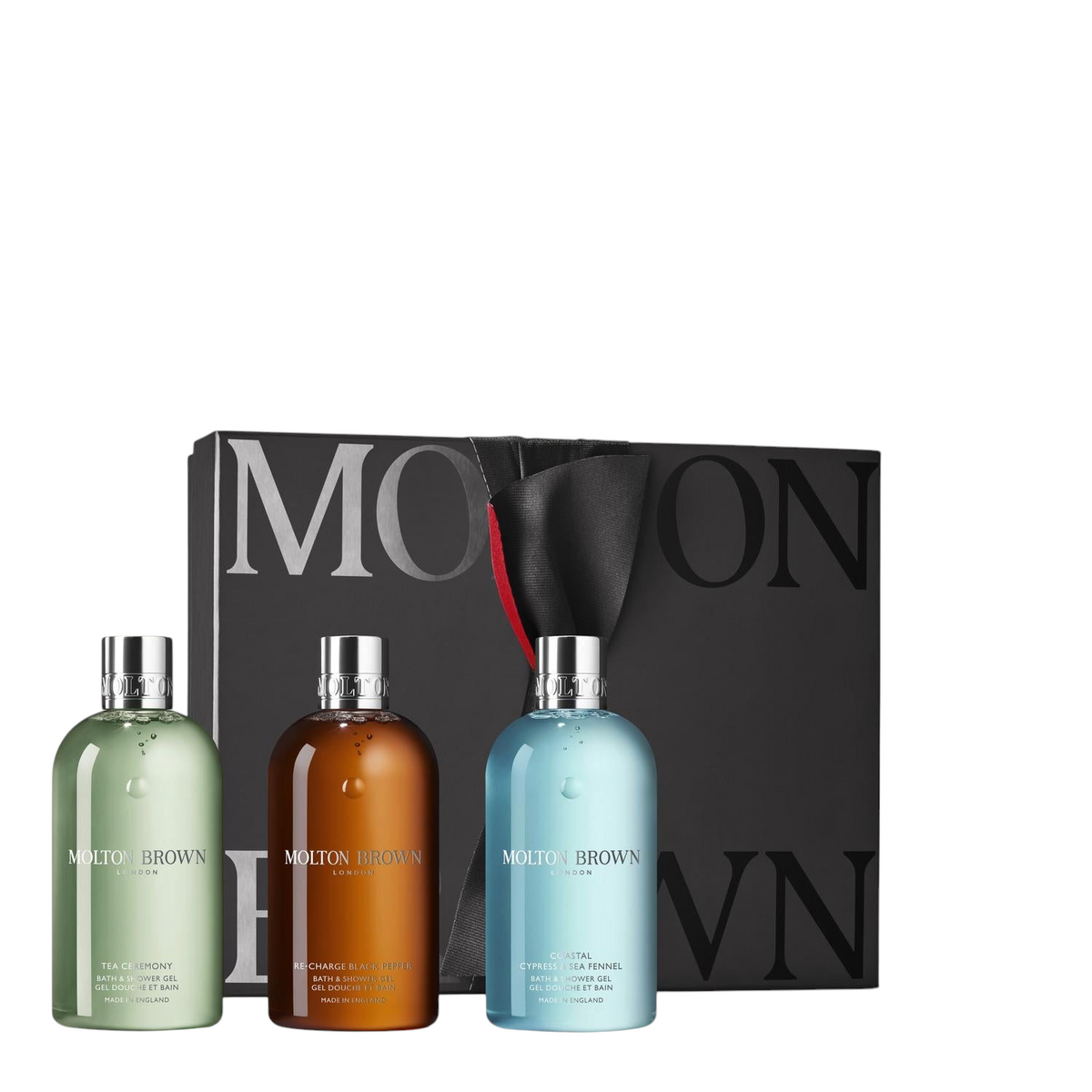 Miller Collective Bathing Trio Gift Set featuring three woody and fresh body wash bottles in a black gift box.
