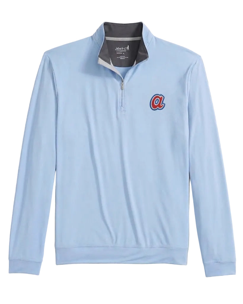 Light blue long-sleeve shirt with a logo on a gray background