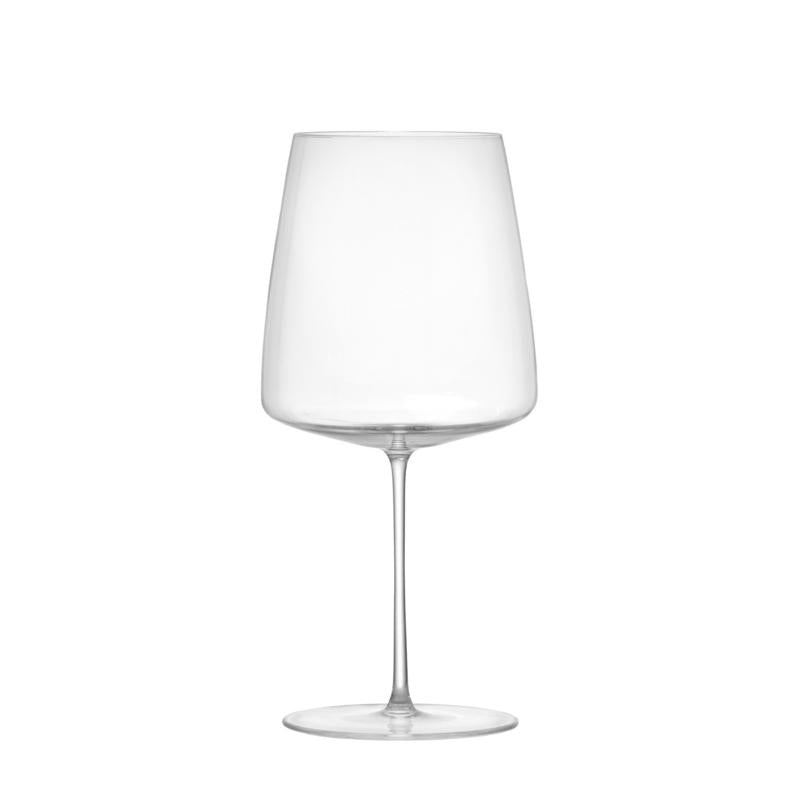 Clear wine glass on a white background