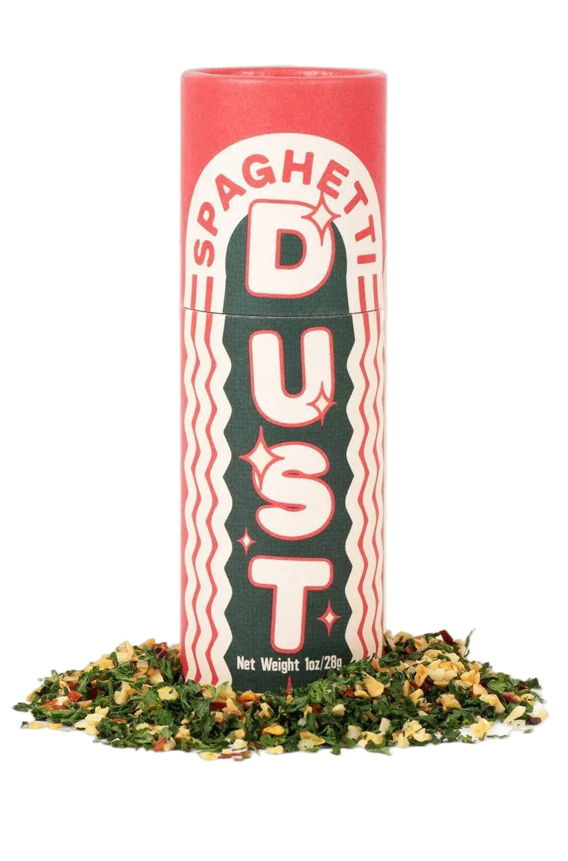 Spaghetti Dust container with a small pile of 'dust' on a beige background