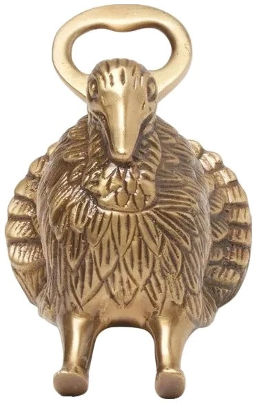Brass bottle opener shaped like a hedgehog on a white background