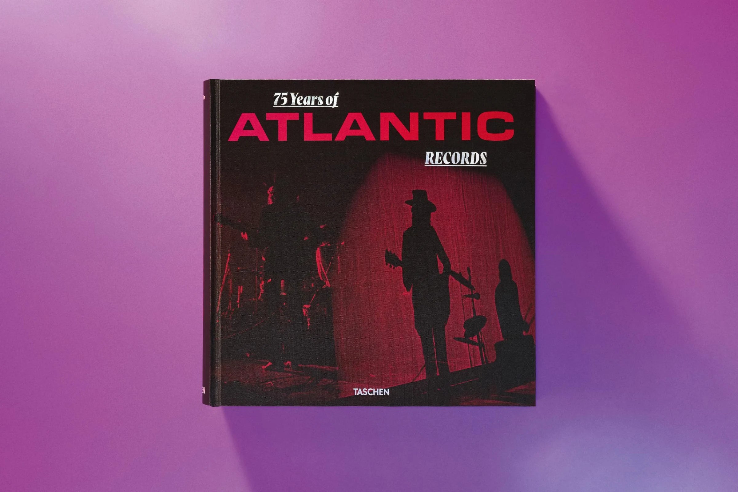 Book titled '75 Years of Atlantic Records' on a purple background
