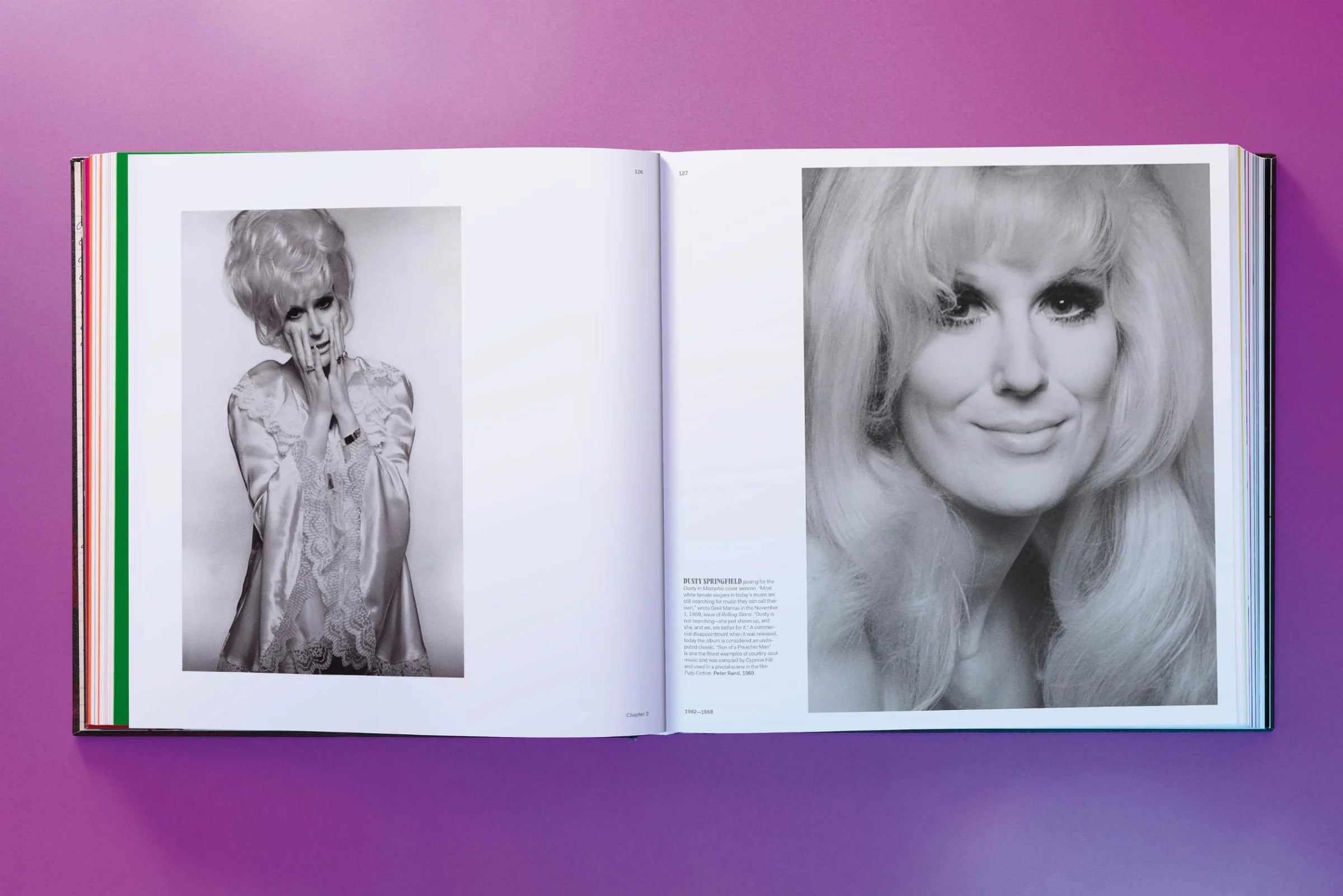 Open book showing black and white portraits of Dusty Springfield on a purple background