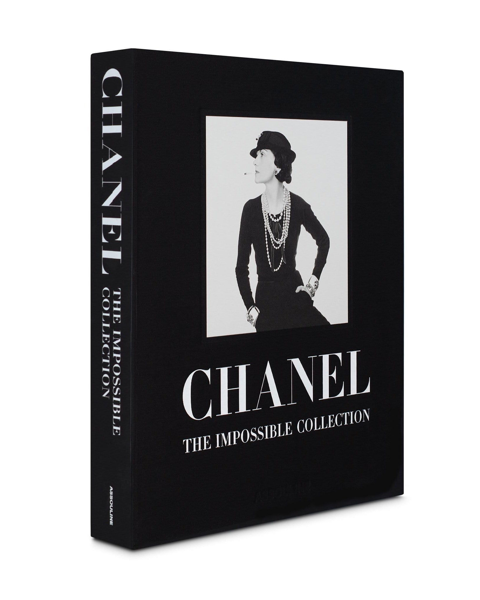 Black book titled 'Chanel: The Impossible Collection' with a black and white photo of a woman on the cover.