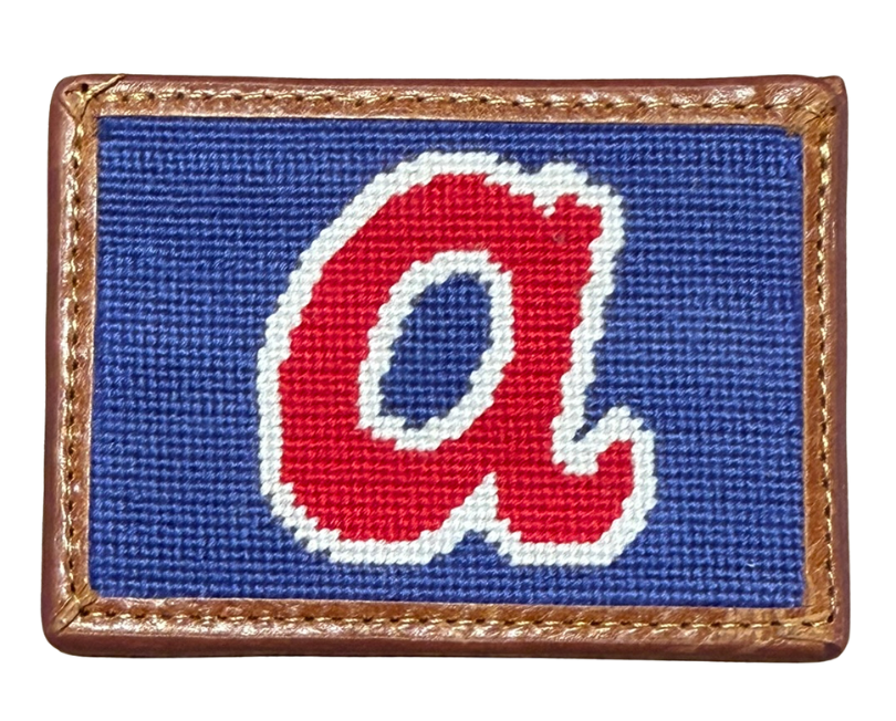 Rectangular needlepoint patch with a red 'a' on blue background