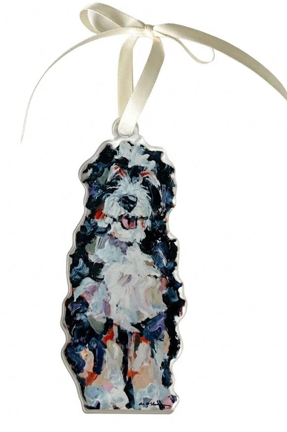 Decorative ornament with a painted dog design on a white background