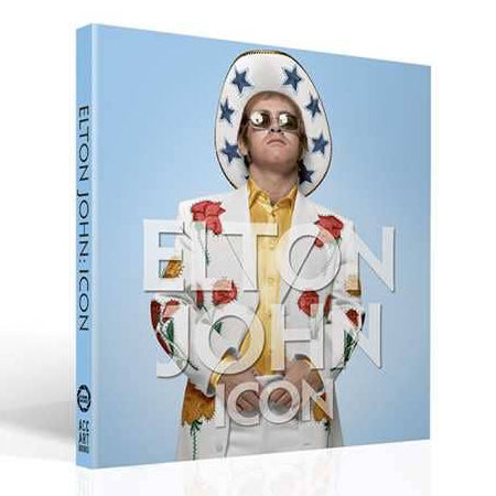 Product packaging featuring a person in a colorful outfit with 'Elton John' branding on a light blue background.