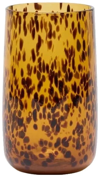 Tortoiseshell-patterned glass on a white background