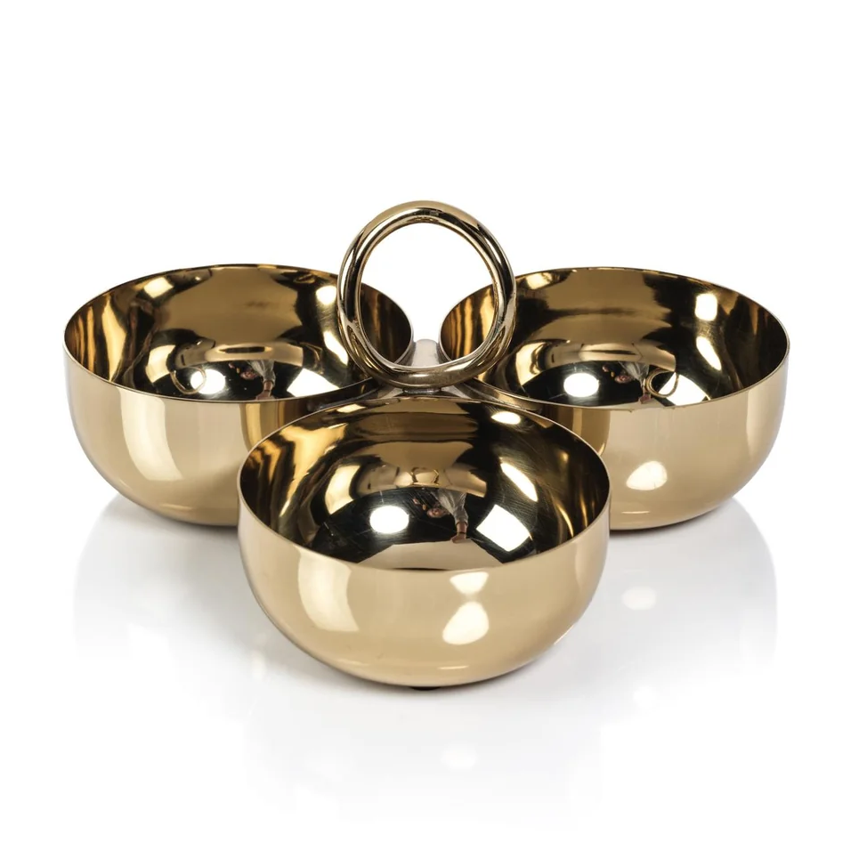 Set of three gold bowls on a white background