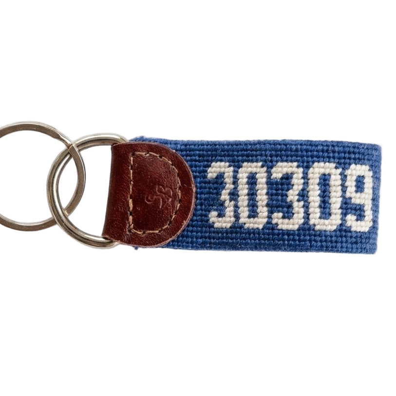 needlepoint Keychain with blue woven band and white text on a white background for 30309 zip code in Atlanta, GA 