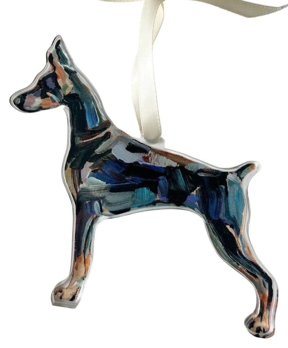 Decorative dog ornament with a ribbon on a white background