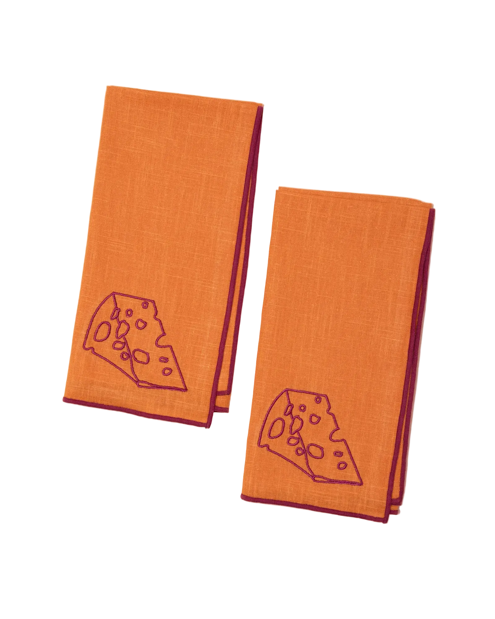 Two orange towels with cheese slice design on a light pink background