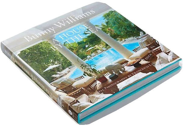 Book titled 'A House By The Sea' by Bunny Williams on a white background