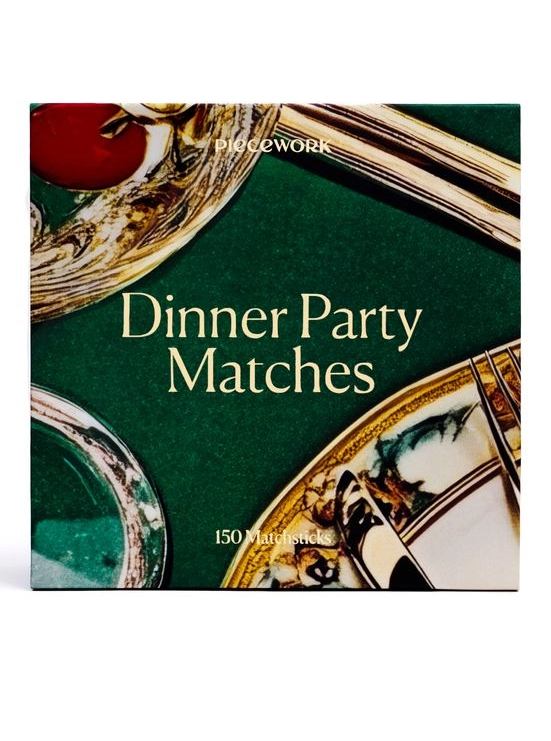 Box of dinner party matches with decorative design on a white background