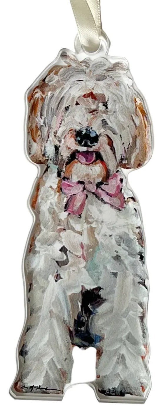 Decorative dog ornament with a ribbon on a white background