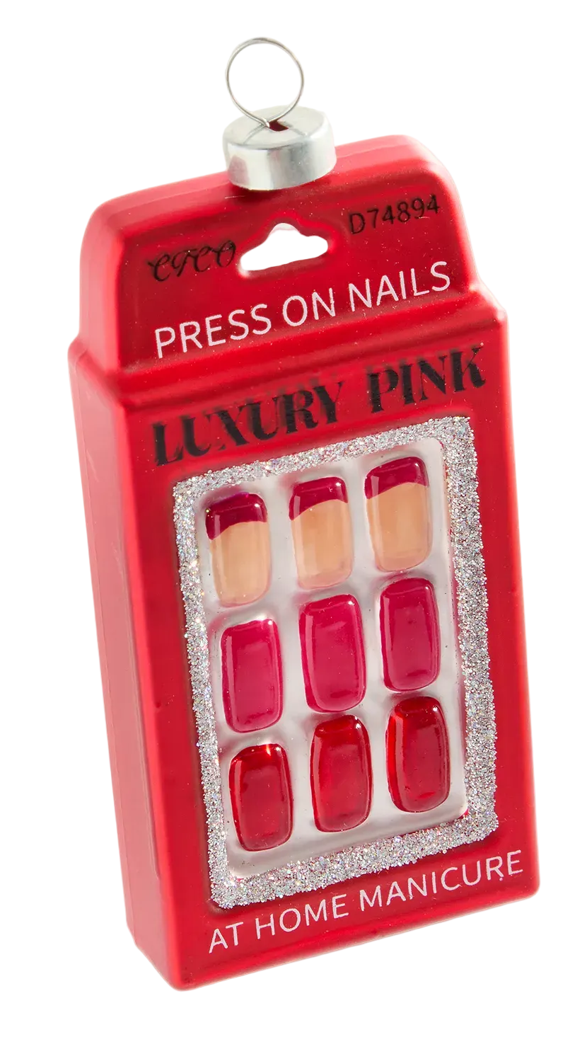 Red box of press-on nails with 'Luxury Pink' text on a white background