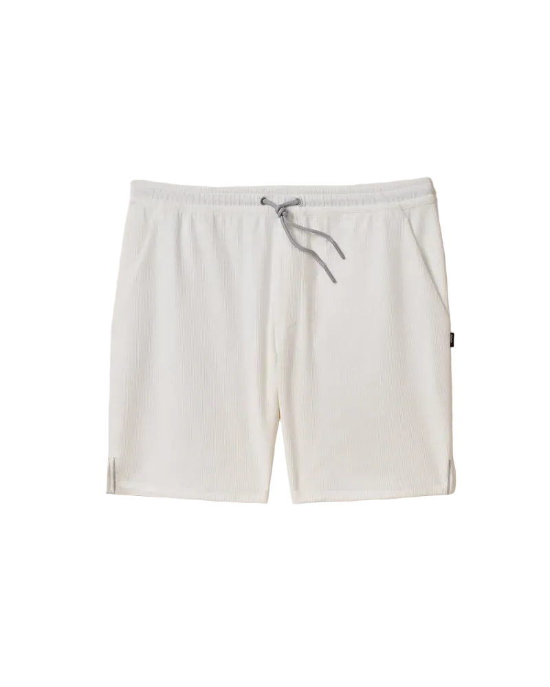 Light gray shorts with a drawstring on a beige background