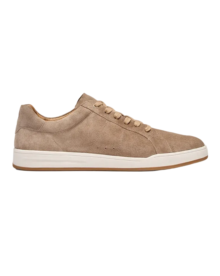 Brown suede sneaker on a light gray background