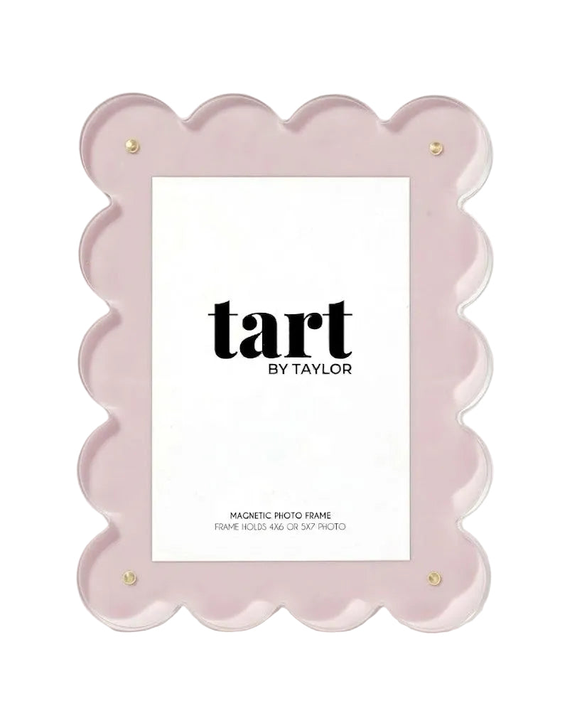 Pink scalloped photo frame with 'tart by Taylor' branding on a white background
