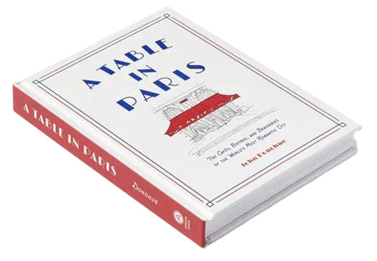 Book titled 'A Table in Paris' on a white background