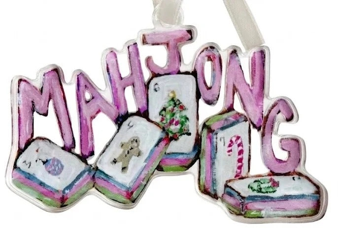 Decorative ornament with 'MAHJONG' text and tile design on a white background