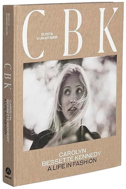 Book titled 'CBK' with a cover featuring a black and white photo of a woman on a white background