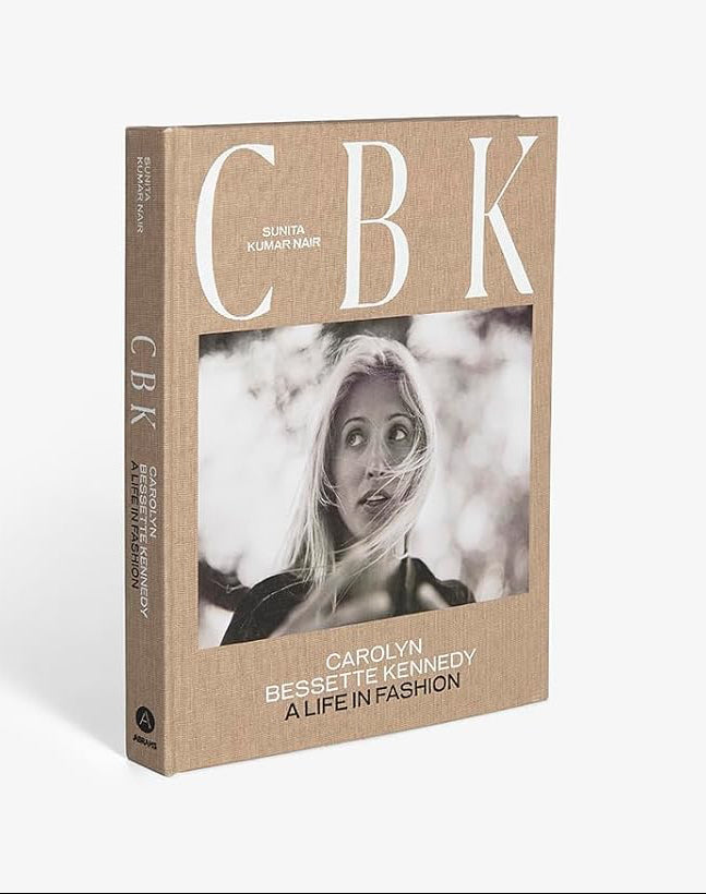 Book titled 'CBK' with a cover featuring a black and white photo of a woman on a white background
