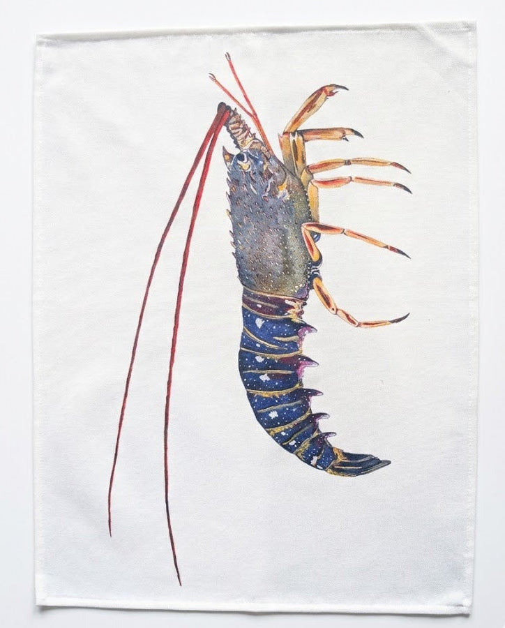 Tea towel with a lobster design on a white background